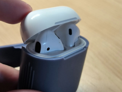 The gentle snap of the case closing